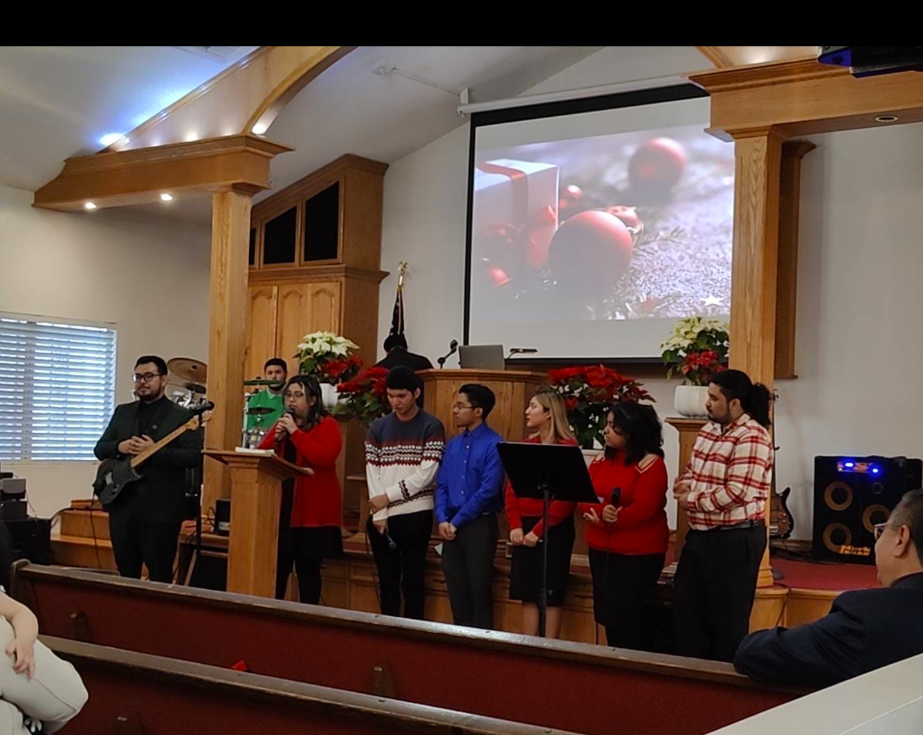 Young people worshipping together